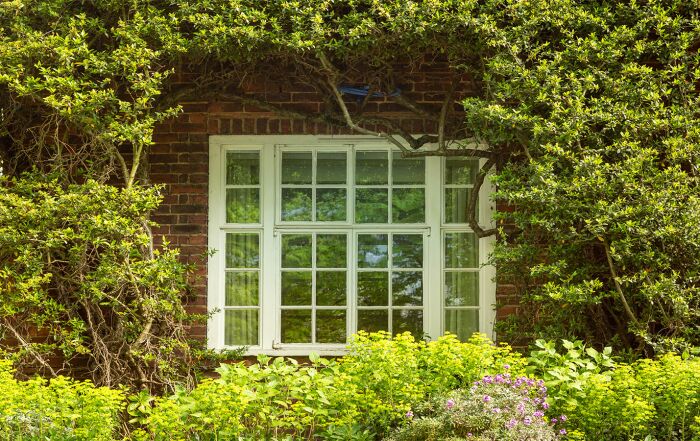 Classic brick home in Richmond with casement style windows.