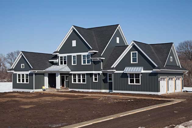 Iron gray James Hardie® shingle siding in a developing neighborhood Central Virginia.
