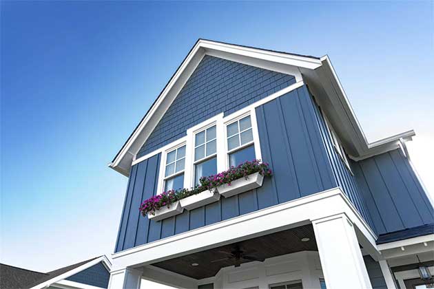 Evening blue Hardie® home siding replacement in Bon Air, VA.